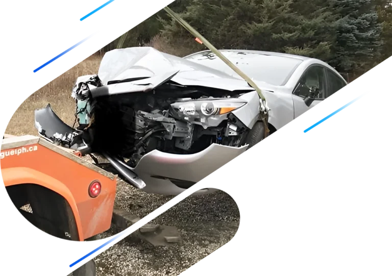 Damaged vehicle at accident recovery scene