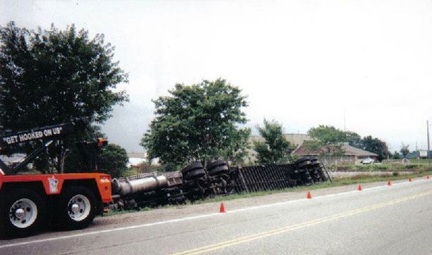overturned truck beside road
